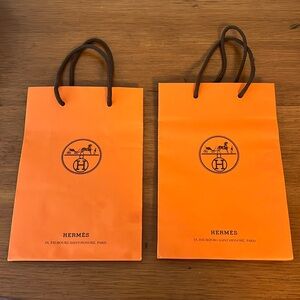 Two small authentic Hermes paper shopping bags